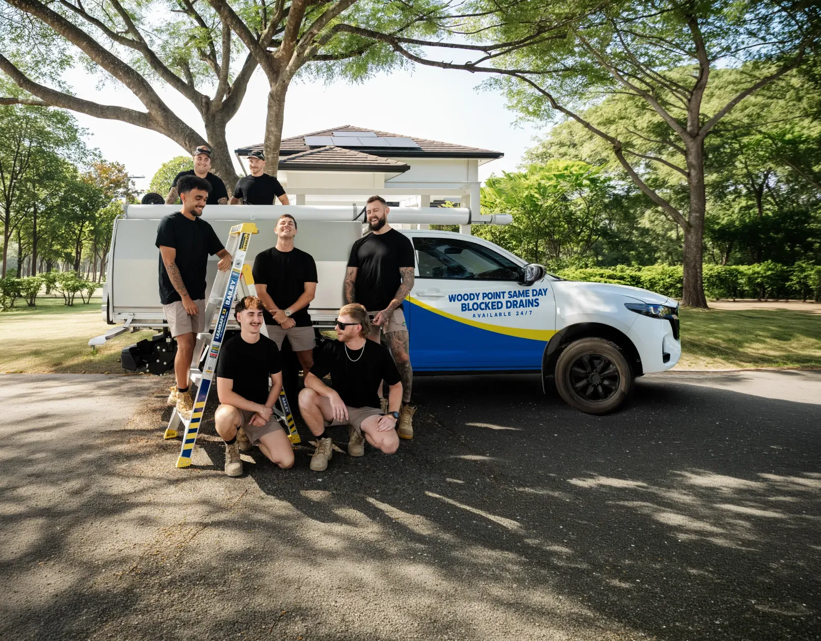 Woody Point Same Day Blocked Drains ute and team